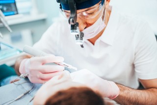 Fixing Broken Teeth and Preserving Smiles: How Our Family-Friendly Dental Office Works Wonders with Root Canals and Crowns